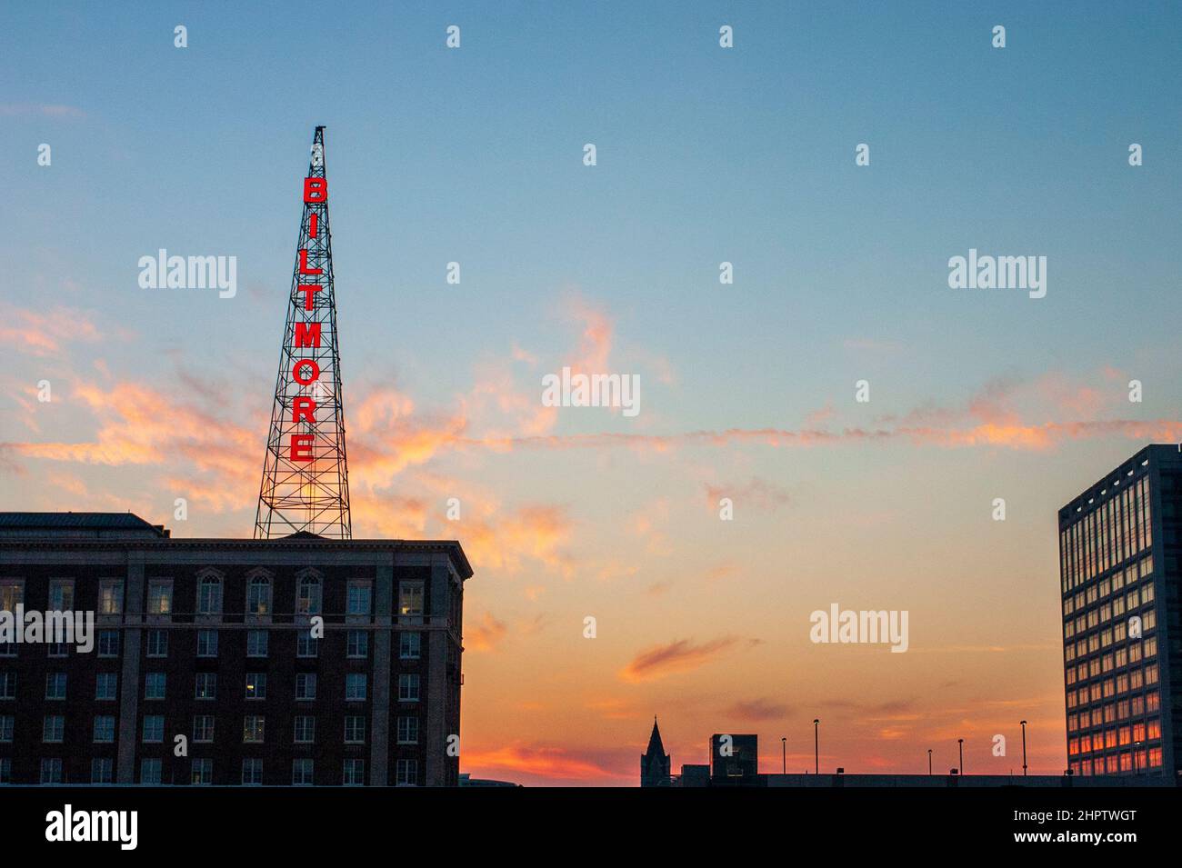Biltmore WSB transmission Tower at Sunset: A sunset view of one end of the iconic and historic original WSB radio transmission tower located on the top of this historic Atlanta Hotel, now owned by the Georgia Institute of Technology. Stock Photo