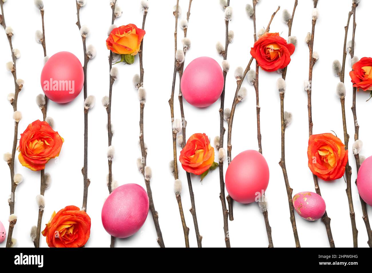 Beautiful roses with painted Easter eggs and pussy willow branches on ...