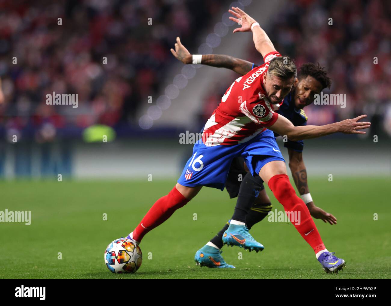 Madrid, Spain, 23rd February 2022. Hector Herrera of Atletico Madrid is pursued by Fred of Manchester United during the UEFA Champions League match at Estadio Metropolitano, Madrid. Picture credit should read: Jonathan Moscrop / Sportimage Stock Photo