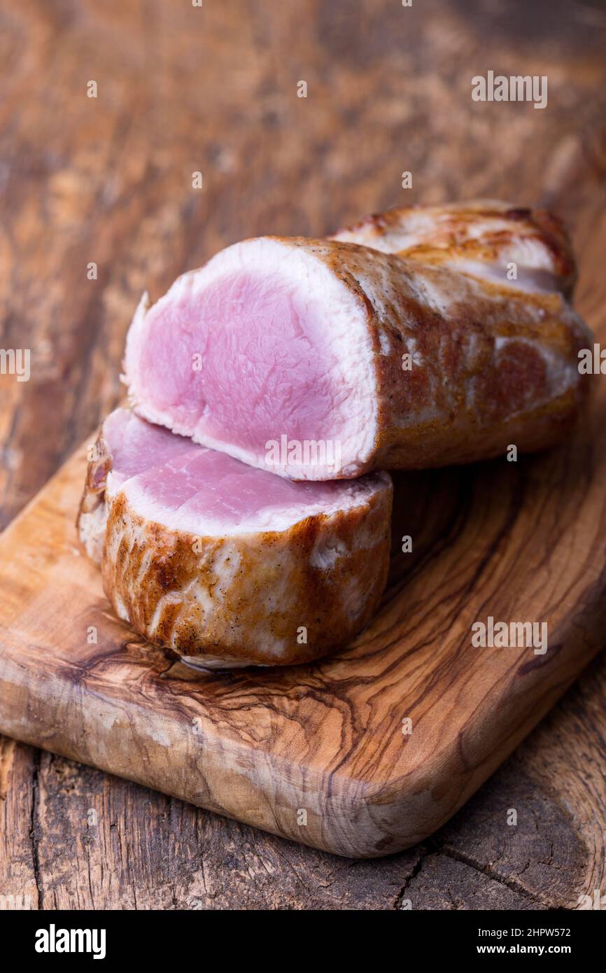 grilled pork fillet on dark wood Stock Photo Alamy