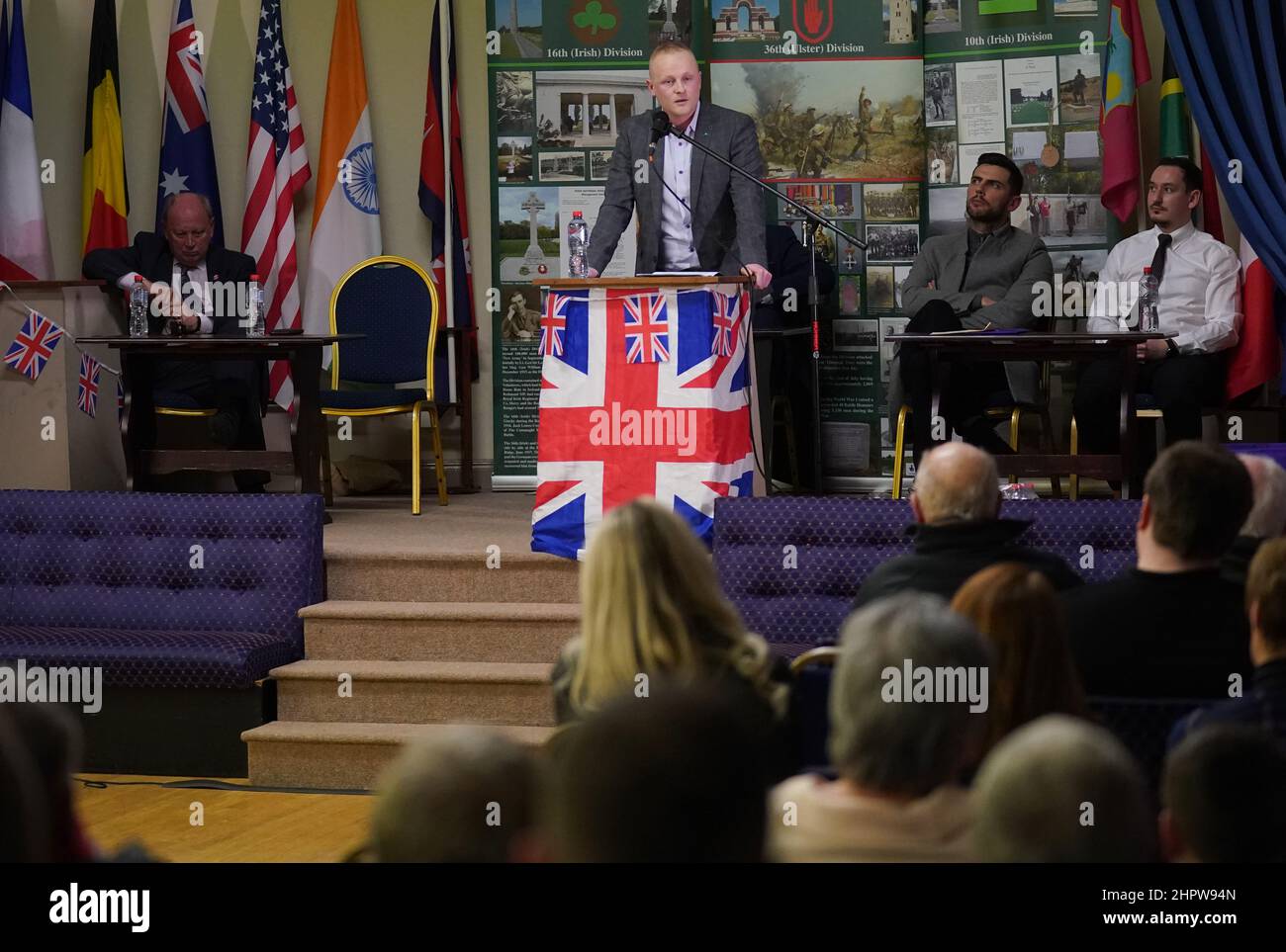 Jamie Bryson (centre) takes part in a rally against the Northern Ireland Protocol at Carlton Street Orange Hall, Portadown, in County Armagh, Northern Ireland. Picture date: Wednesday February 23, 2022. Stock Photo