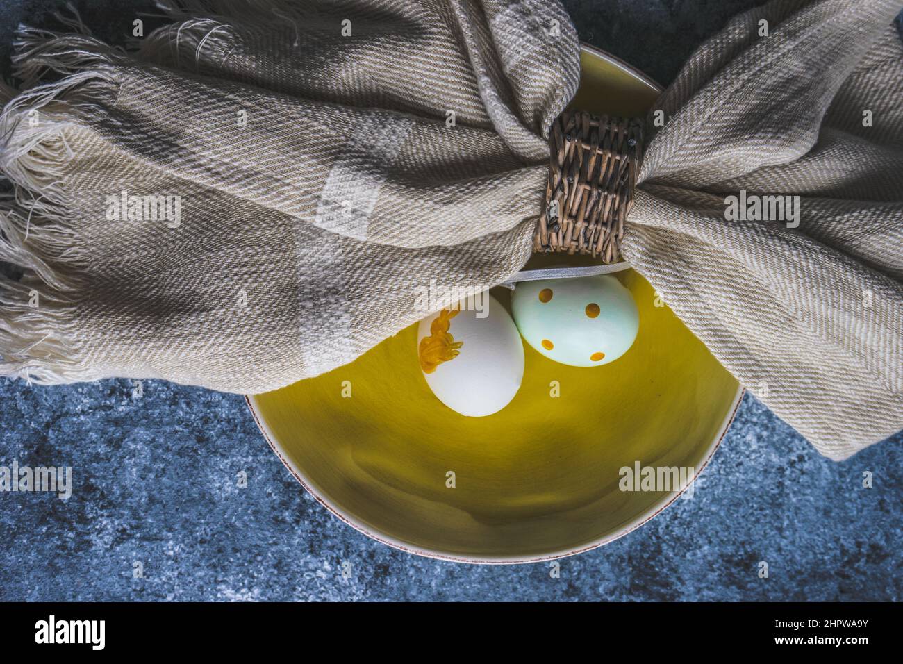 Easter minimalistic place setting on concrete background Stock Photo
