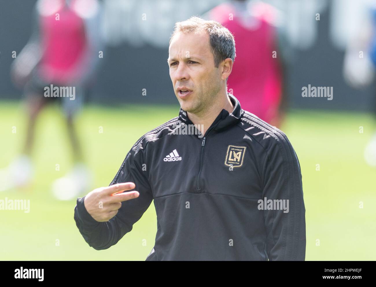 Los Angeles, USA. 23rd Feb, 2022. Steven Cherundolo stands on the training pitch of the Los Angeles Football Club and gesticulates. The former Bundesliga professional from Hannover 96 is about to start his first season as head coach in MLS. Credit: Maximilian Haupt/dpa/Alamy Live News Stock Photo