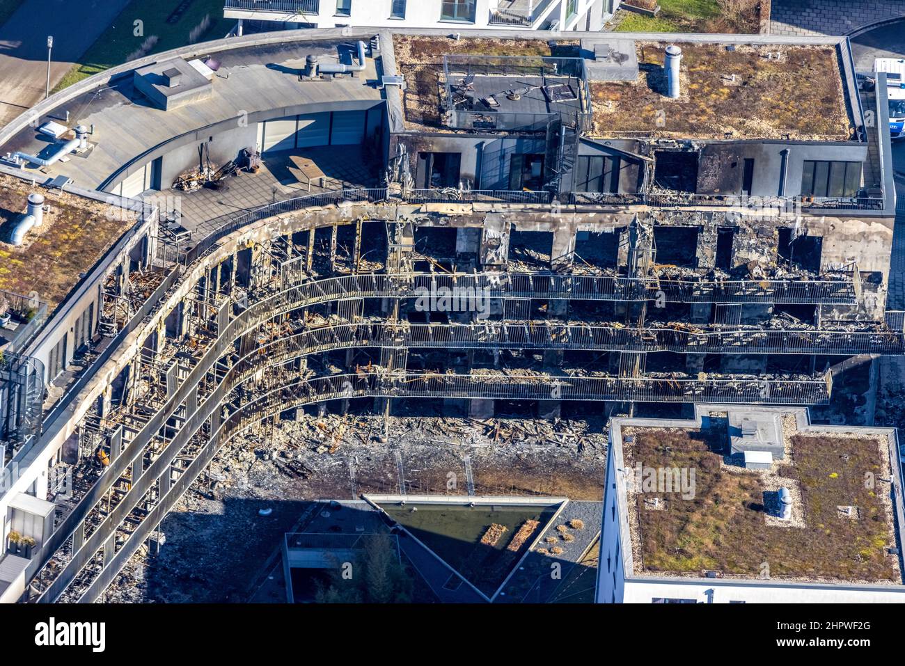 Fire house, aerial view of the burnt out house in Bargmannstraße on Wednesday 23 February 2022 in Essen. A complete residential complex burnt out in t Stock Photo