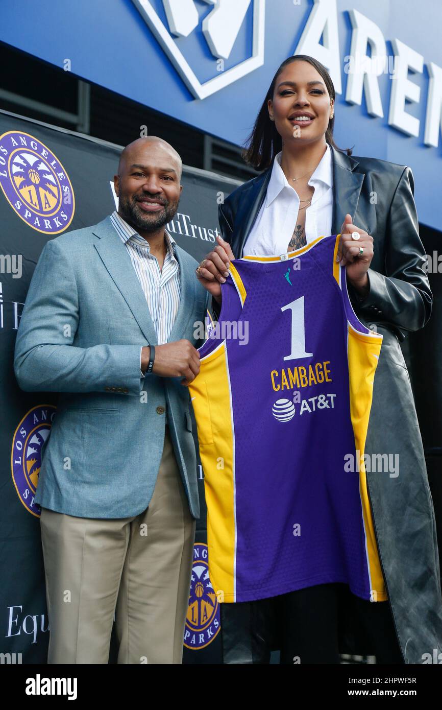 Los Angeles, California, USA. 23rd Feb, 2022. Los Angeles Sparks new signed  center Liz Cambage poses with her jersey next to head coach Derek Fisher in  a news conference at Crypto.com Arena