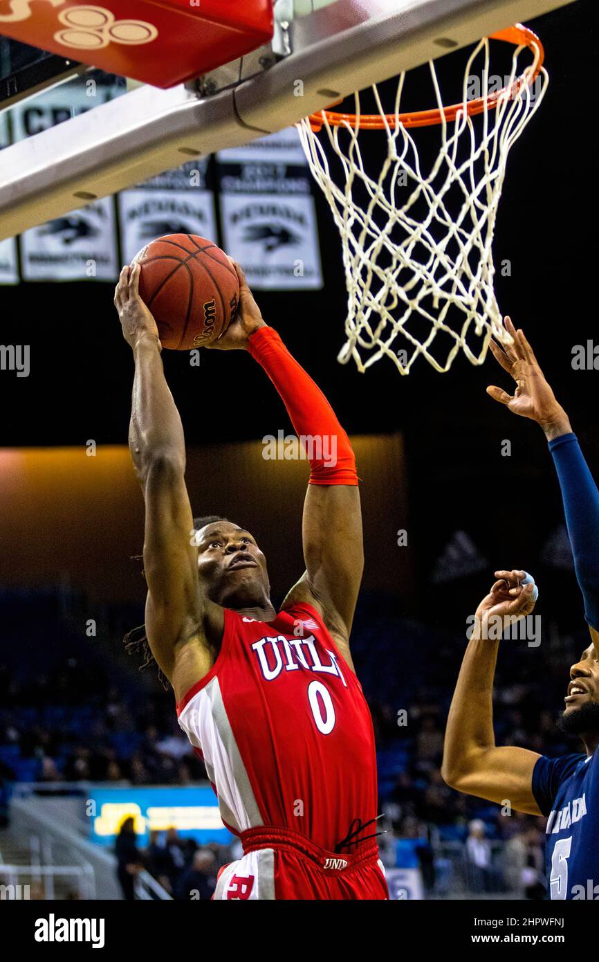 Reno, United States. 22nd Feb, 2022. Las Vegas forward #0 Victor Iwuakor goes up for two against Reno's forward #5 Warren Washington during the University of Las Vegas vs University of Nevada Reno match at Lawlor event centre and University of Las Vegas came out victorious, 62 to 54. Credit: SOPA Images Limited/Alamy Live News Stock Photo