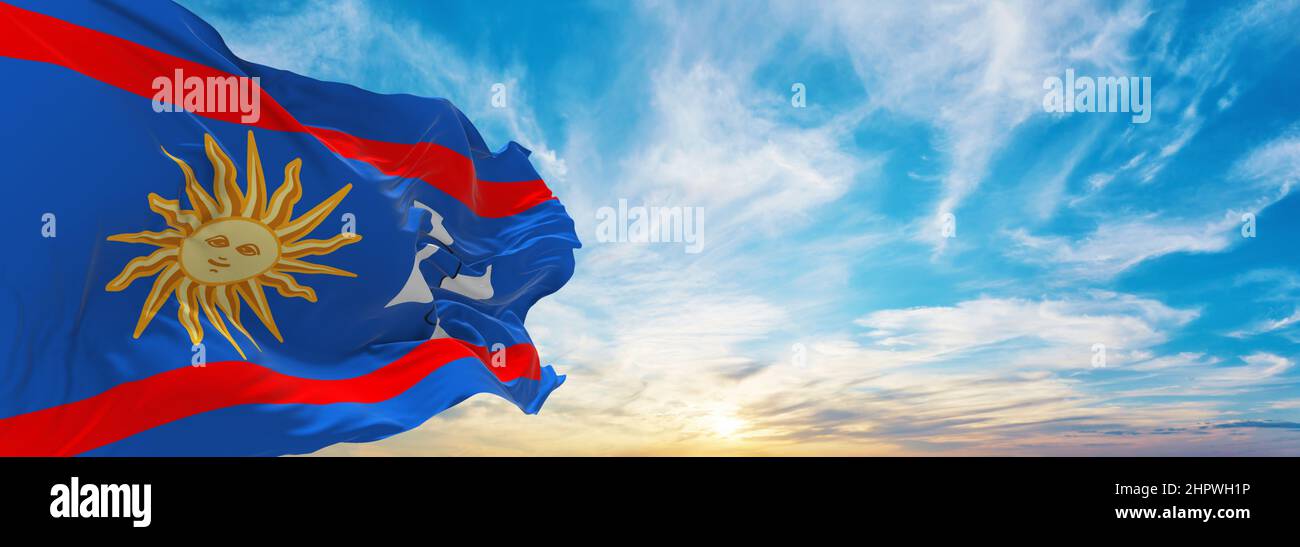flag of Vinnytsia region , Ukraine at cloudy sky background on sunset, panoramic view. Ukrainian travel and patriot concept. copy space for wide banne Stock Photo