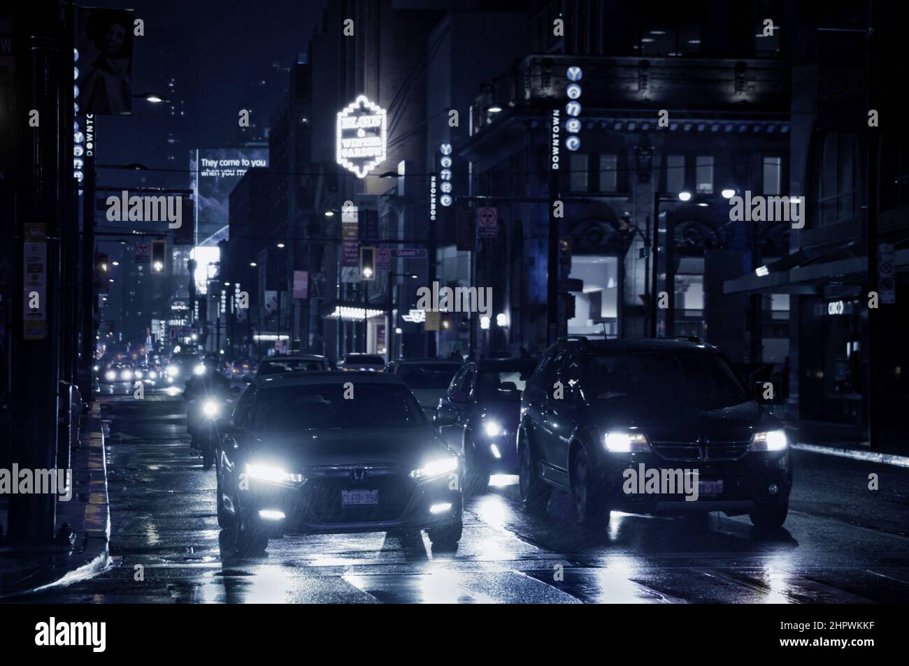 Toronto, Canada - 10 30 2021: Night rain pouring down on cars