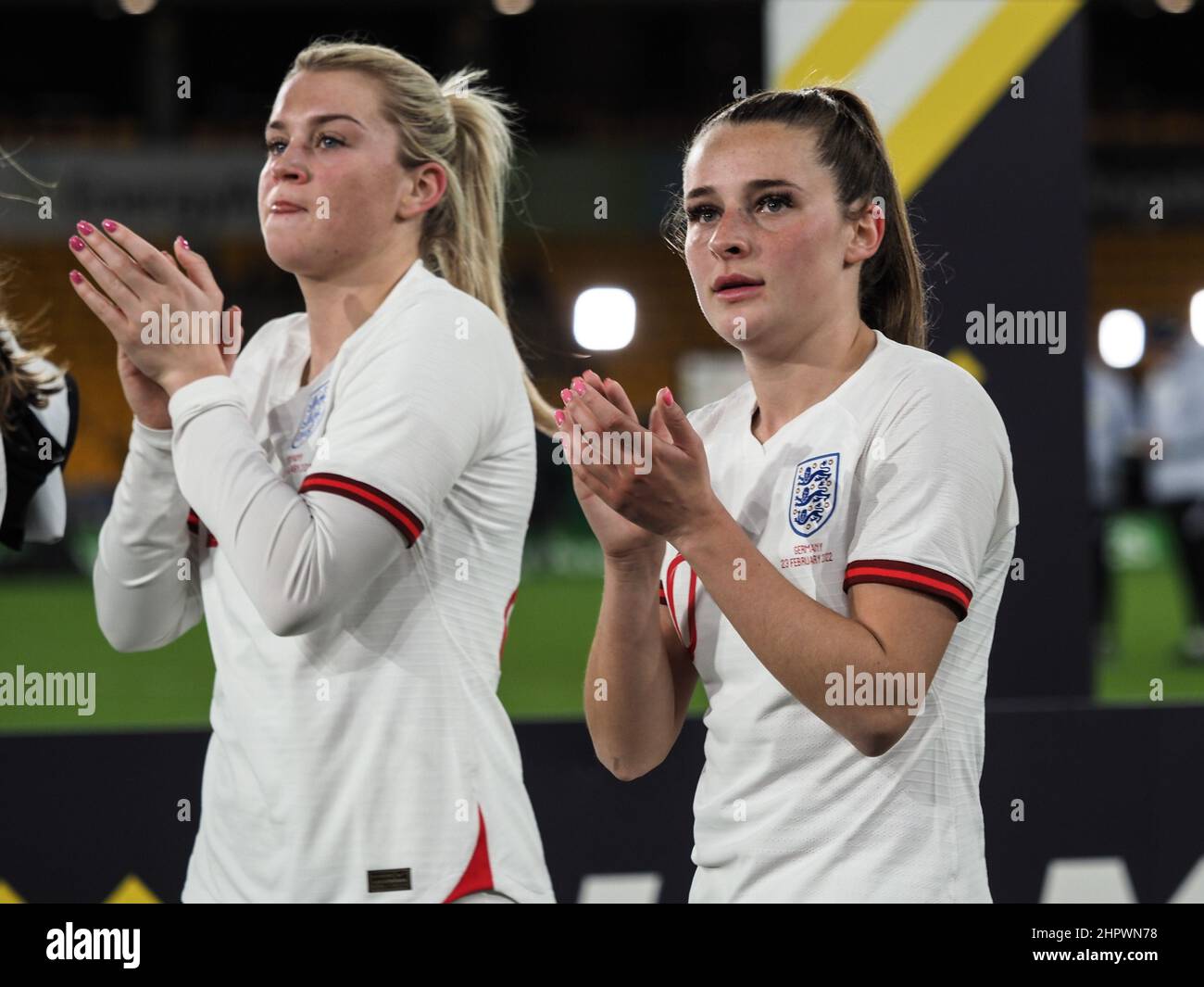 Wolverhampton, UK. 23rd Feb, 2022. Wolverhampton, England, February Alessia Russo (22 England) and Ella Toone (10 England) applaud fans after the Arnold Clark football match between England and Germany at Molineux Stadium in Wolverhampton, England Natalie Mincher/SPP Credit: SPP Sport Press Photo. /Alamy Live News Stock Photo