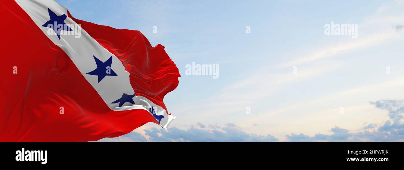 flag of Marica , Brazil at cloudy sky background on sunset, panoramic view. Brazilian travel and patriot concept. copy space for wide banner. 3d illus Stock Photo