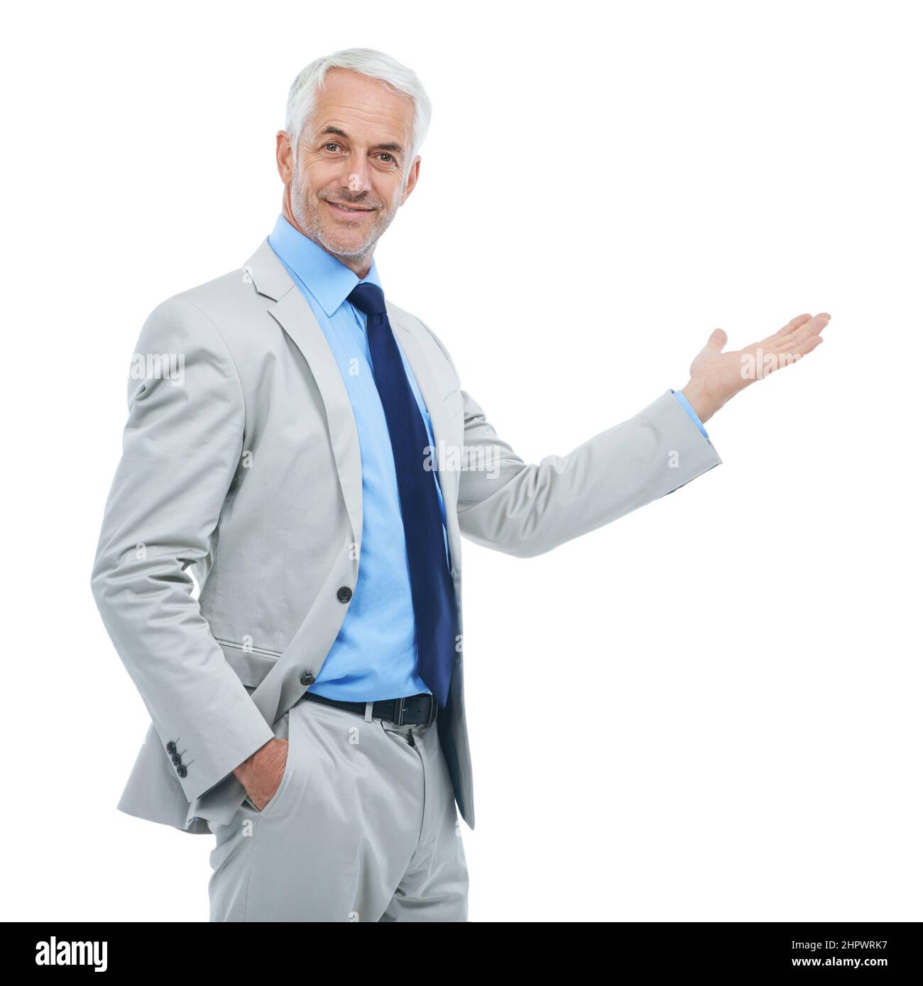 The next big thing in business. Studio portrait of a handsome businessman gesturing to copyspace isolated on white. Stock Photo