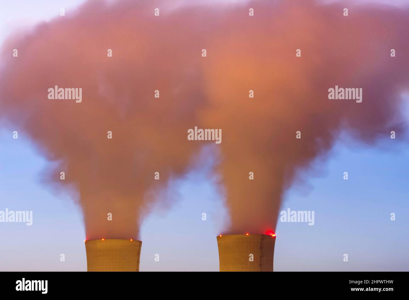 Nuclear power plant, cooling towers, blue sky, water vapour Stock Photo