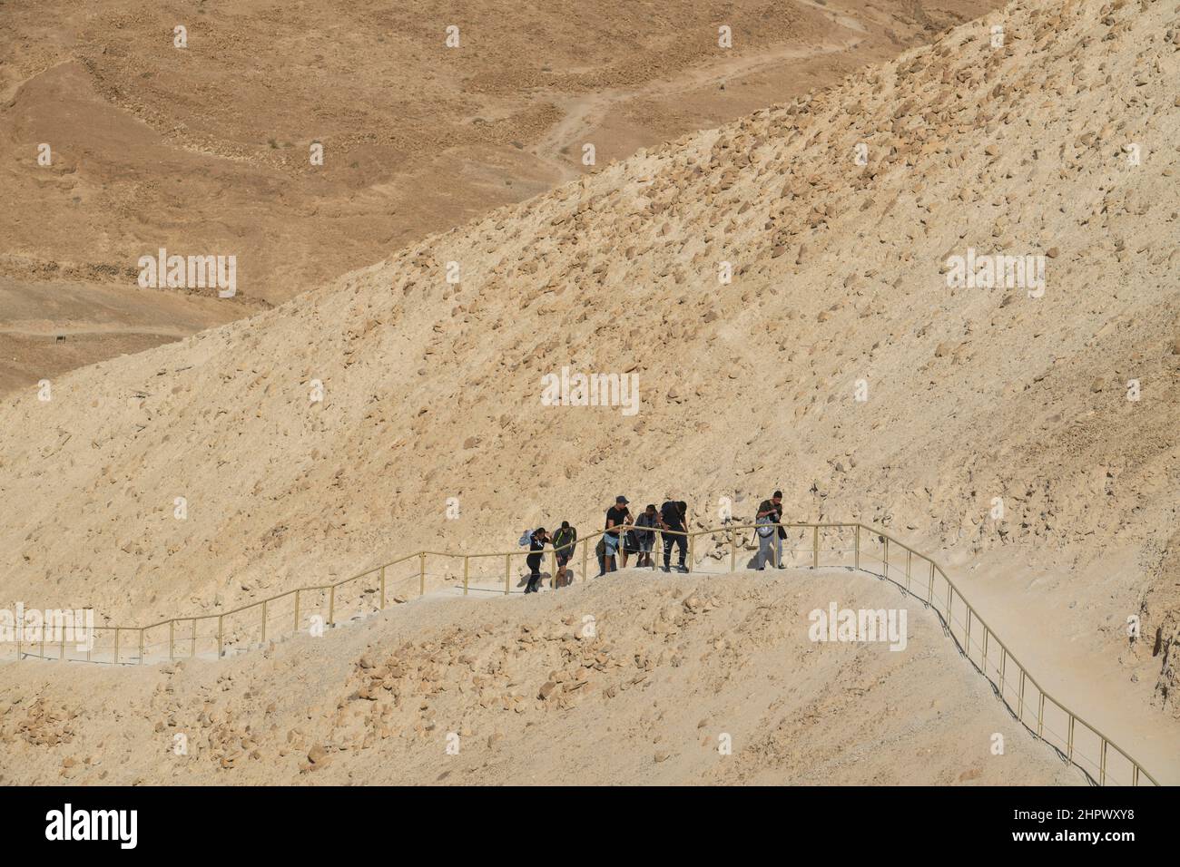 Tourist trail, Roman siege ramp, fortification, ruins of Masada, Israel Stock Photo