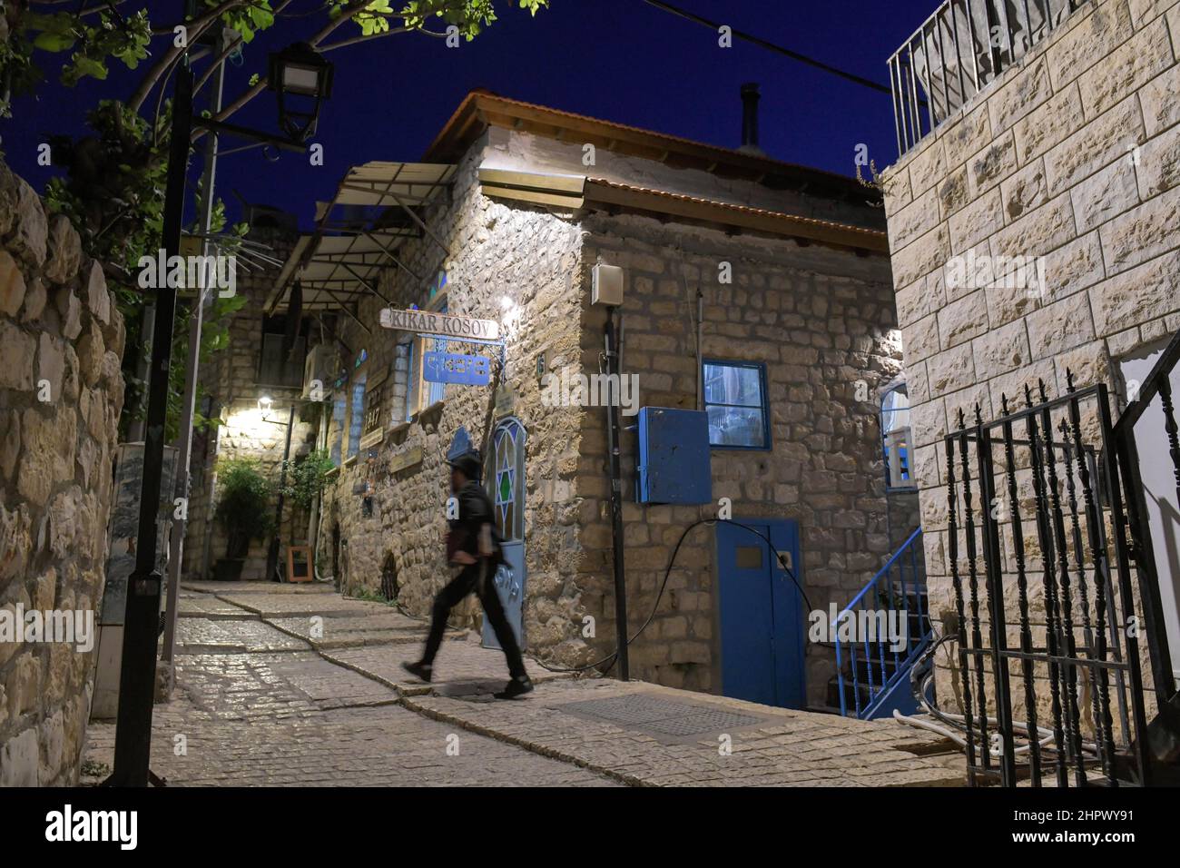 Passers-by, Kikar Kosov Synagogue, Old City Alley, Safed, Israel Stock Photo