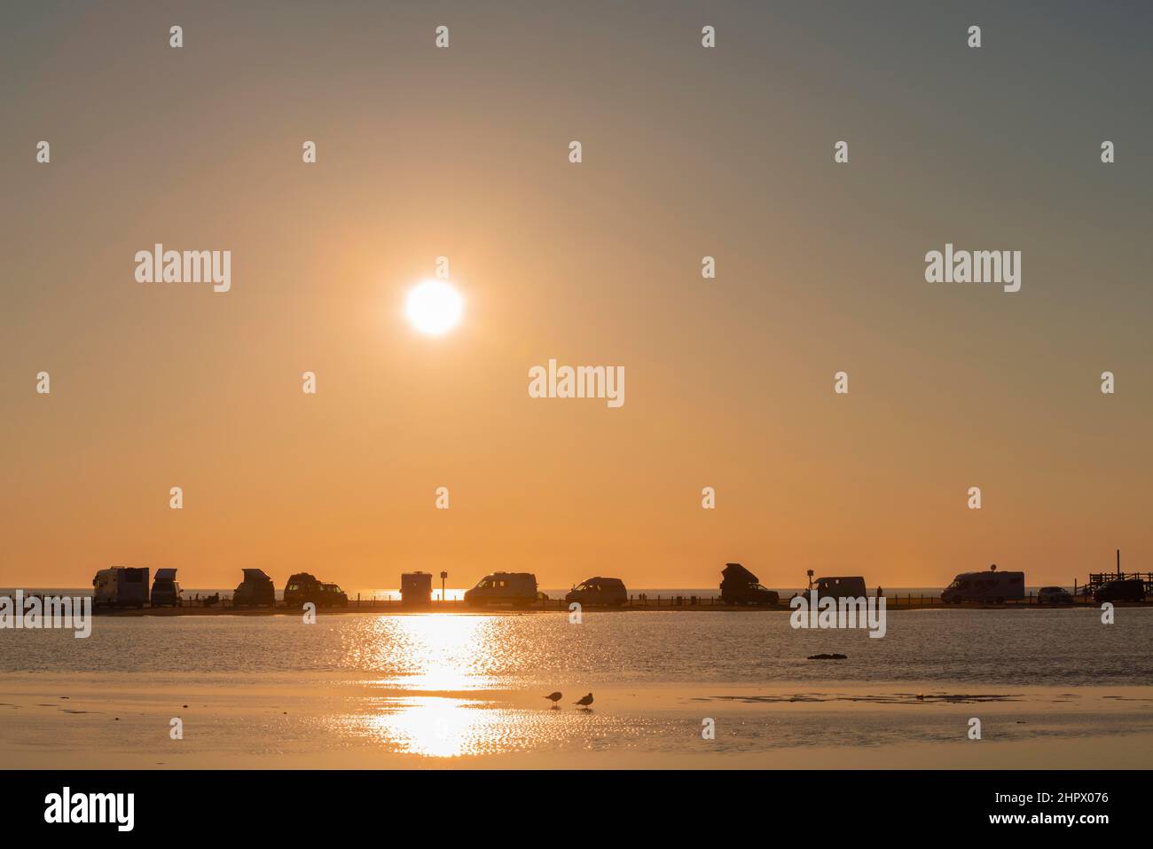 Camper on the beach in the sunset, St. -Peter-Ording, North Sea, Schleswig-Holstein, Germany Stock Photo