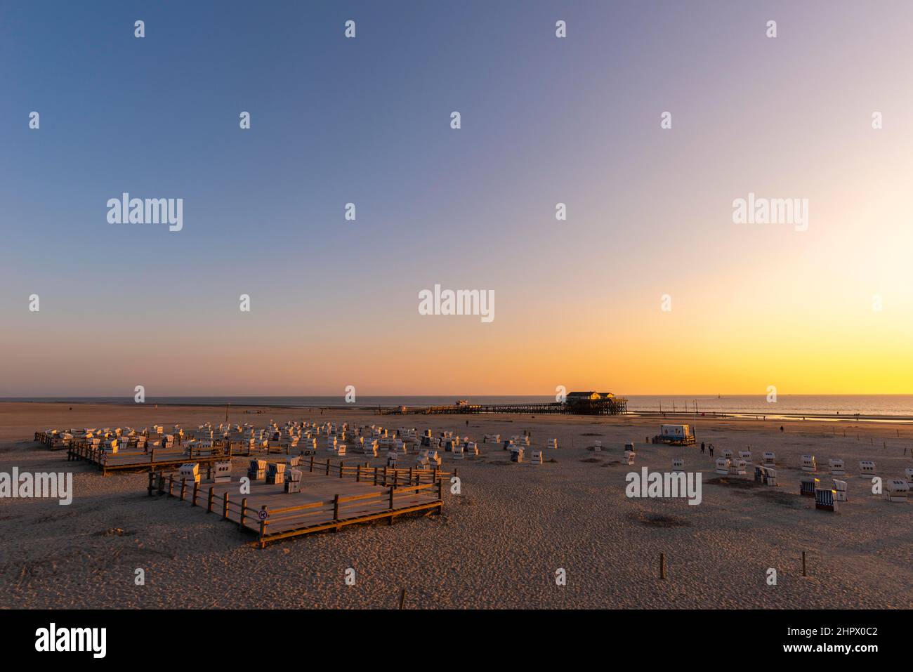 Beach chairs, beach at sunset, St. -Peter-Ording, North Sea, Schleswig-Holstein, Germany Stock Photo