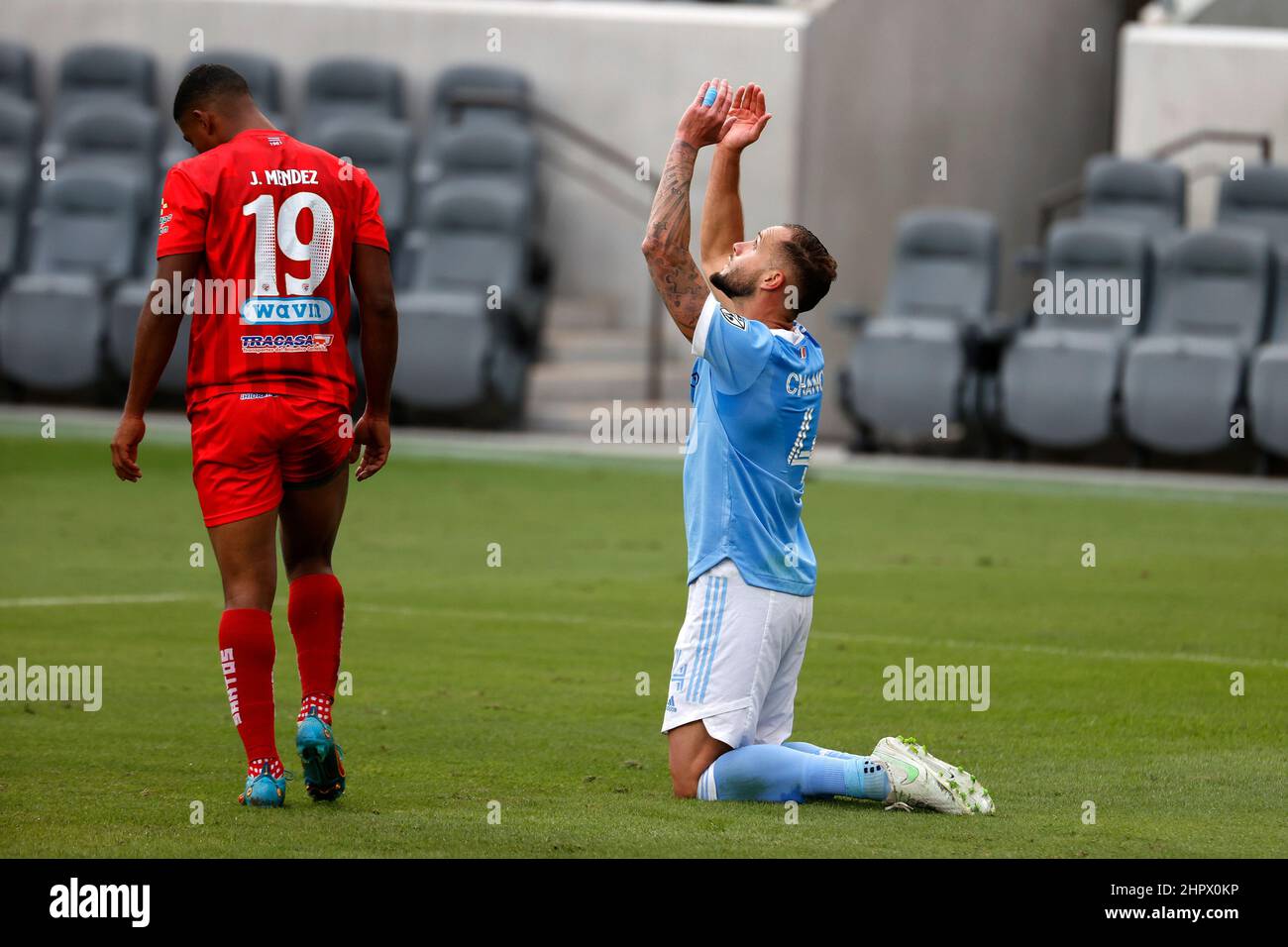 Los Angeles, California, USA. 23rd Feb, 2022. New York City FC defender Maxime Chanot (4) celebrates his gaol next to Santos De Guapiles forward Erson Mendez (19) during the second leg of a 2022 CONCACAF Champions League Round of 16 soccer match in Los Angeles Wednesday, Feb. 23, 2022. (Credit Image: © Ringo Chiu/ZUMA Press Wire) Stock Photo
