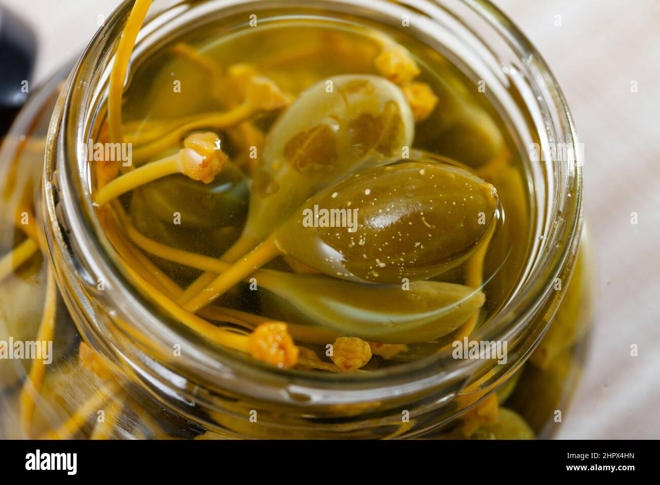 Vegetarian of canned capers in glass jar Stock Photo Alamy