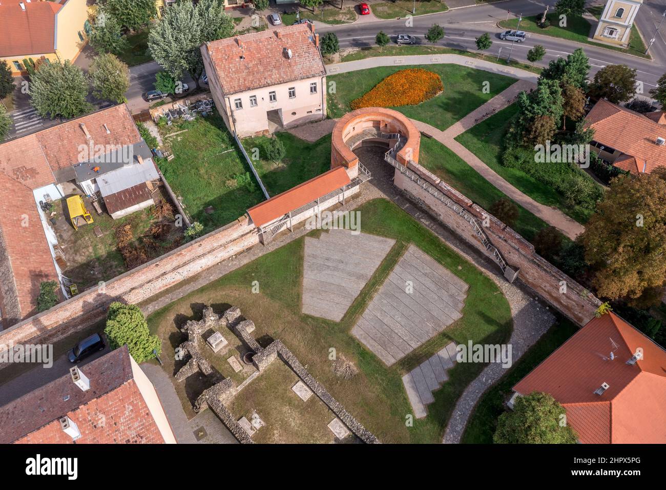 Aerial view of medieval town center of Szecseny fortified against the Ottomans in the middle ages with bastions, walls, castle and Gotchic Church Stock Photo