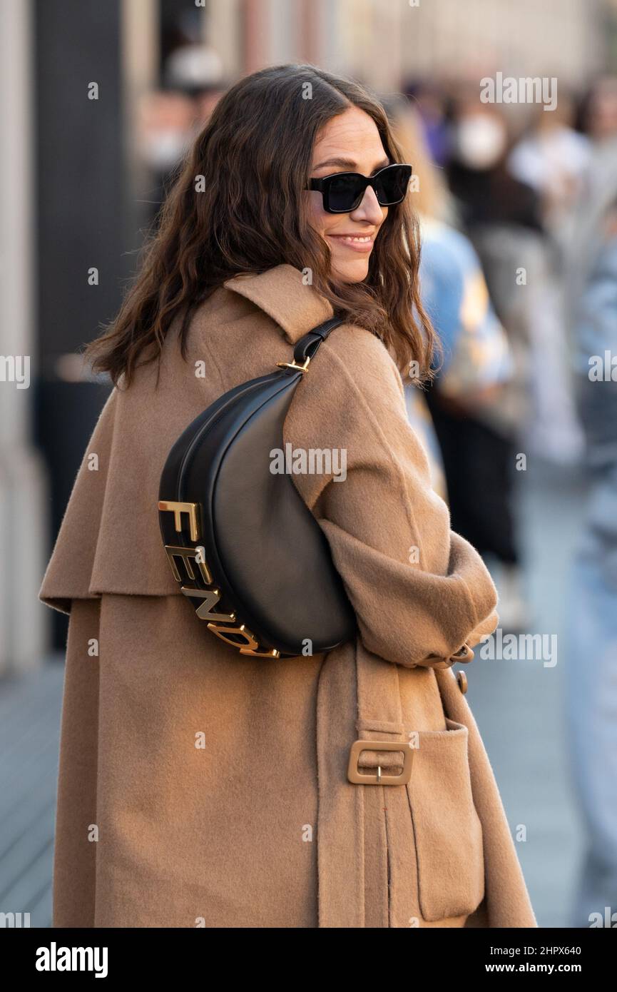 A guest outside Fendi fashion show during the Milan Fashion Week  Fall/Winter 2022/2023 Stock Photo - Alamy