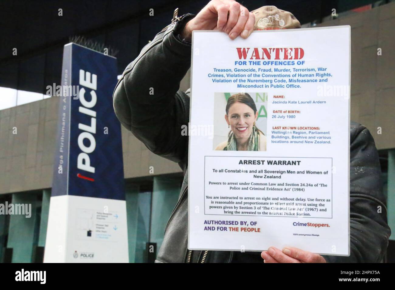An antimandate protester outside Christchurch central police station