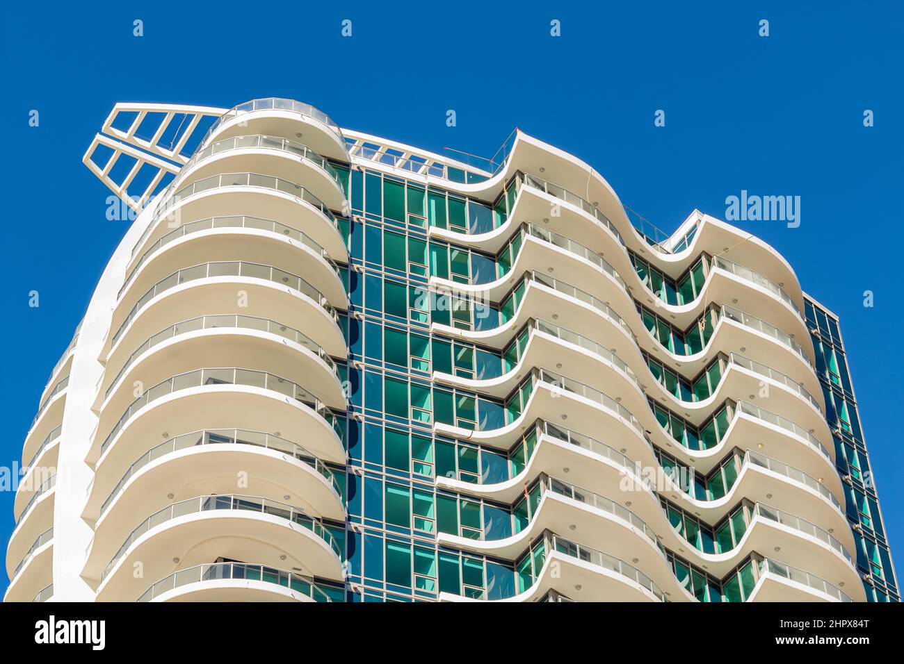 Facade detail of a modern high-rise apartment building. Abstract ...