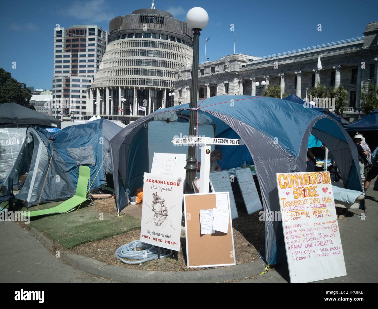 February 24, 2022 - Tent village occupying parliament grounds on Day 17 of the protest against covid vaccine mandates in Wellington, New Zealand Stock Photo