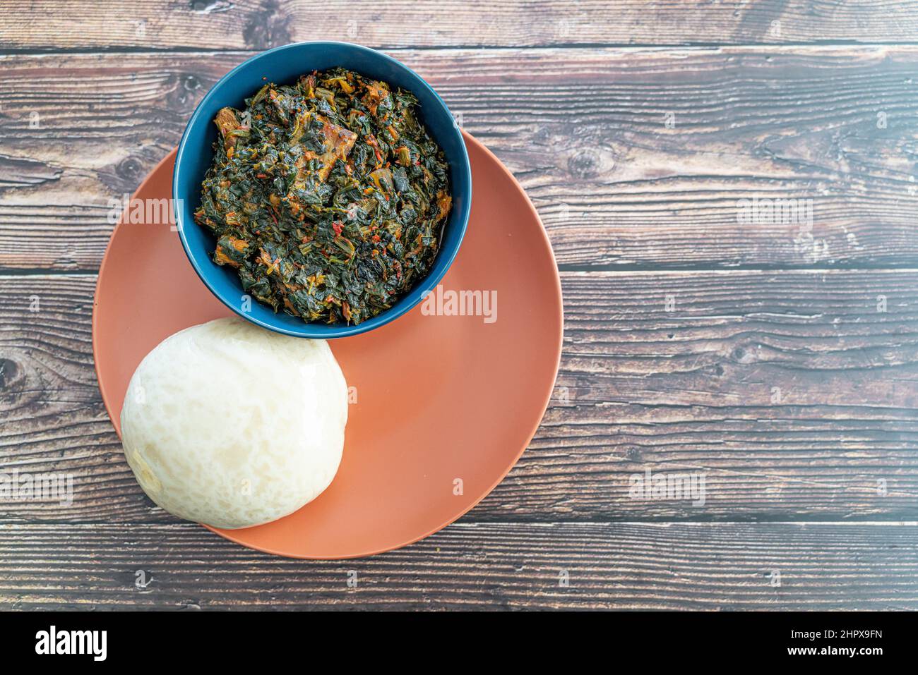 Nigerian Pounded Yam Served with Vegetable Soup ready to eat Stock