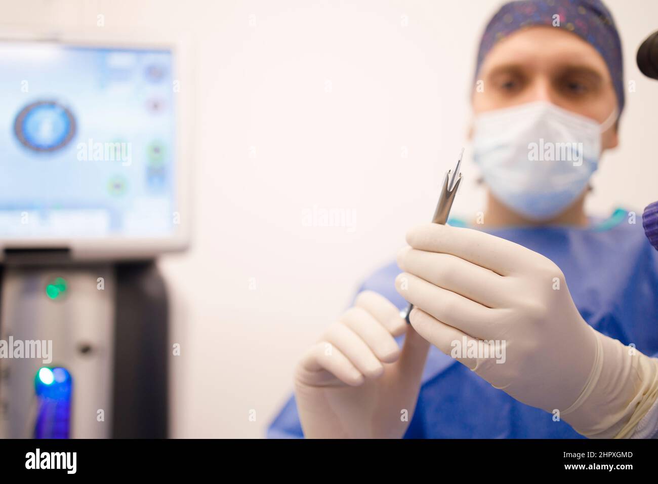 A surgeon preparing his equipment for the surgery Stock Photo