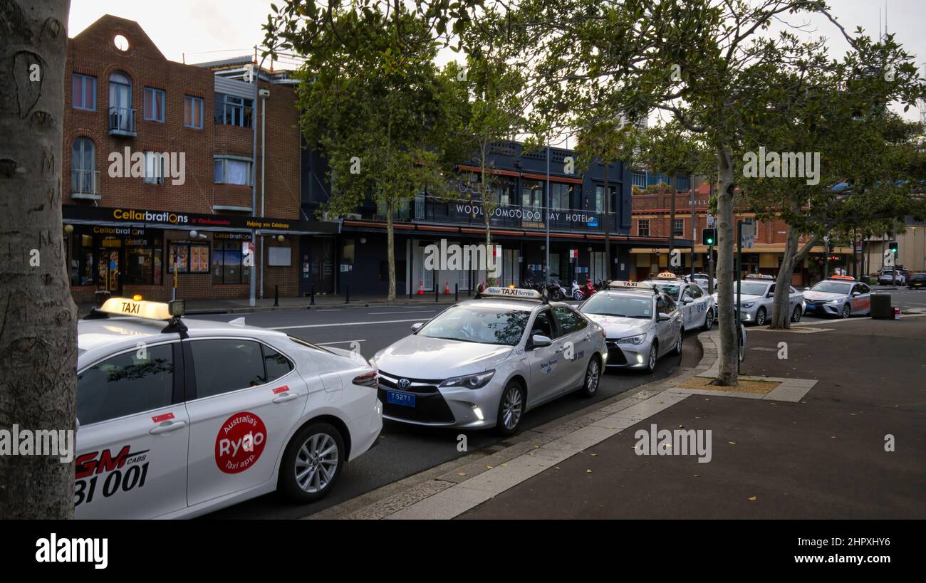 Sydney, New South Wales Australia - December 23 2022: Taxis waiting outside Finger Wharf, Woolloomooloo in Sydney in early evening Stock Photo