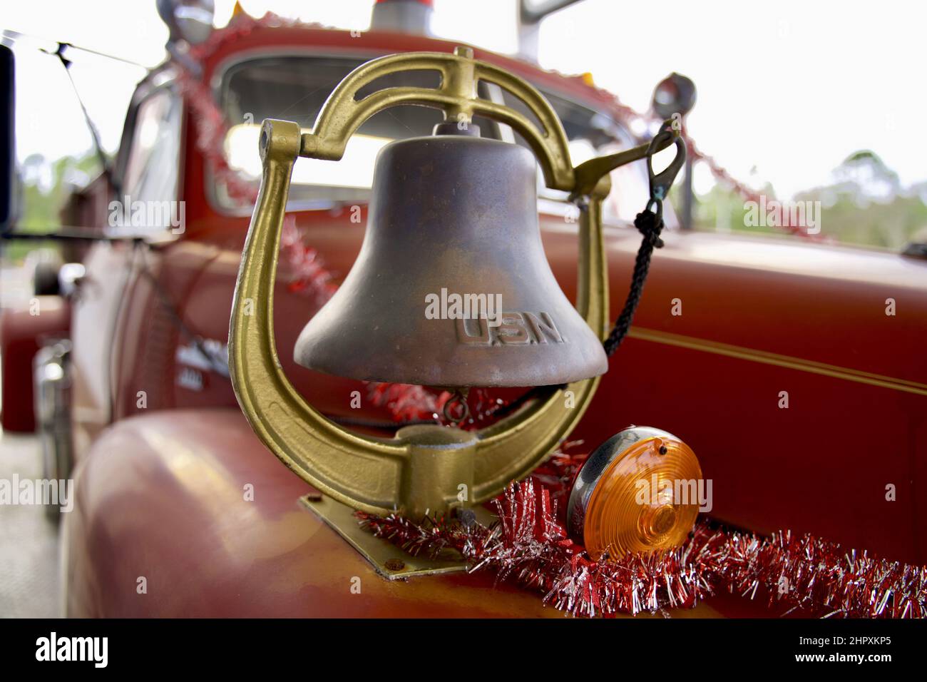 Vintage metal bell on a red antique fire truck Stock Photo Alamy