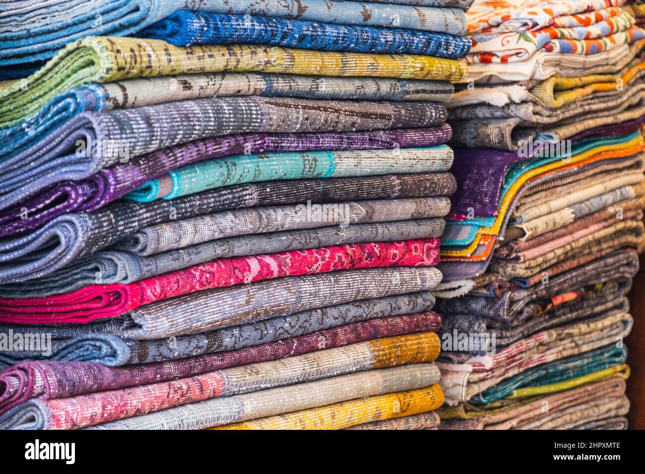 Large rows of pieces of fabric made of cotton, polyester, and 