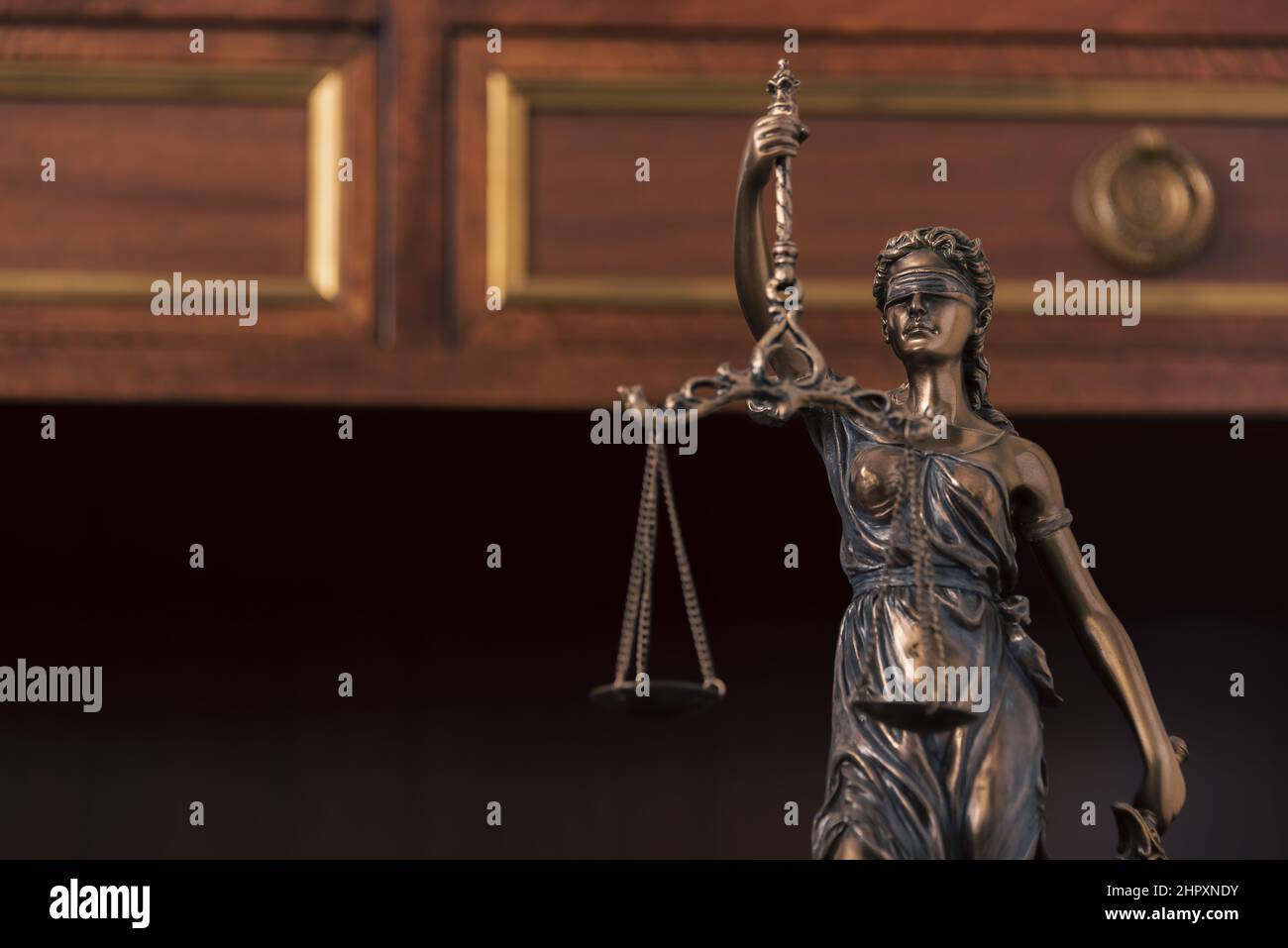 detail of lady justice statue with scales and blindfold Stock Photo Alamy