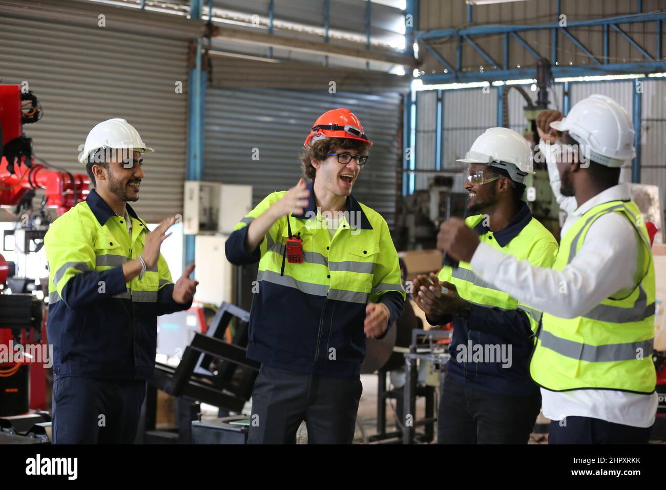 Factory Engineer Operating machines in industry factory. Stock Photo