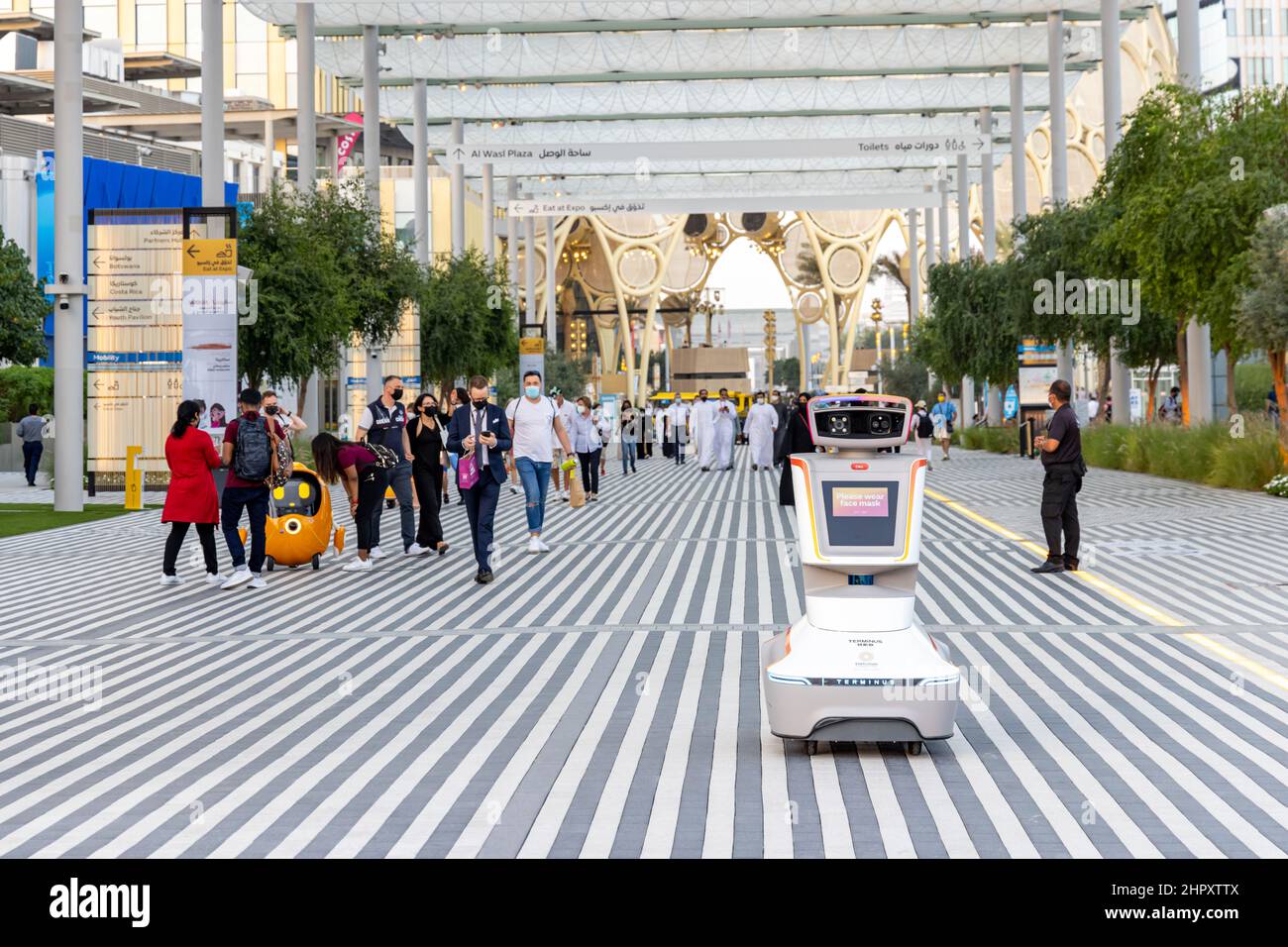 A Terminus security robot displaying a reminder to wear a face mask at the Dubai EXPO 2020 in the United Arab Emirates. Stock Photo