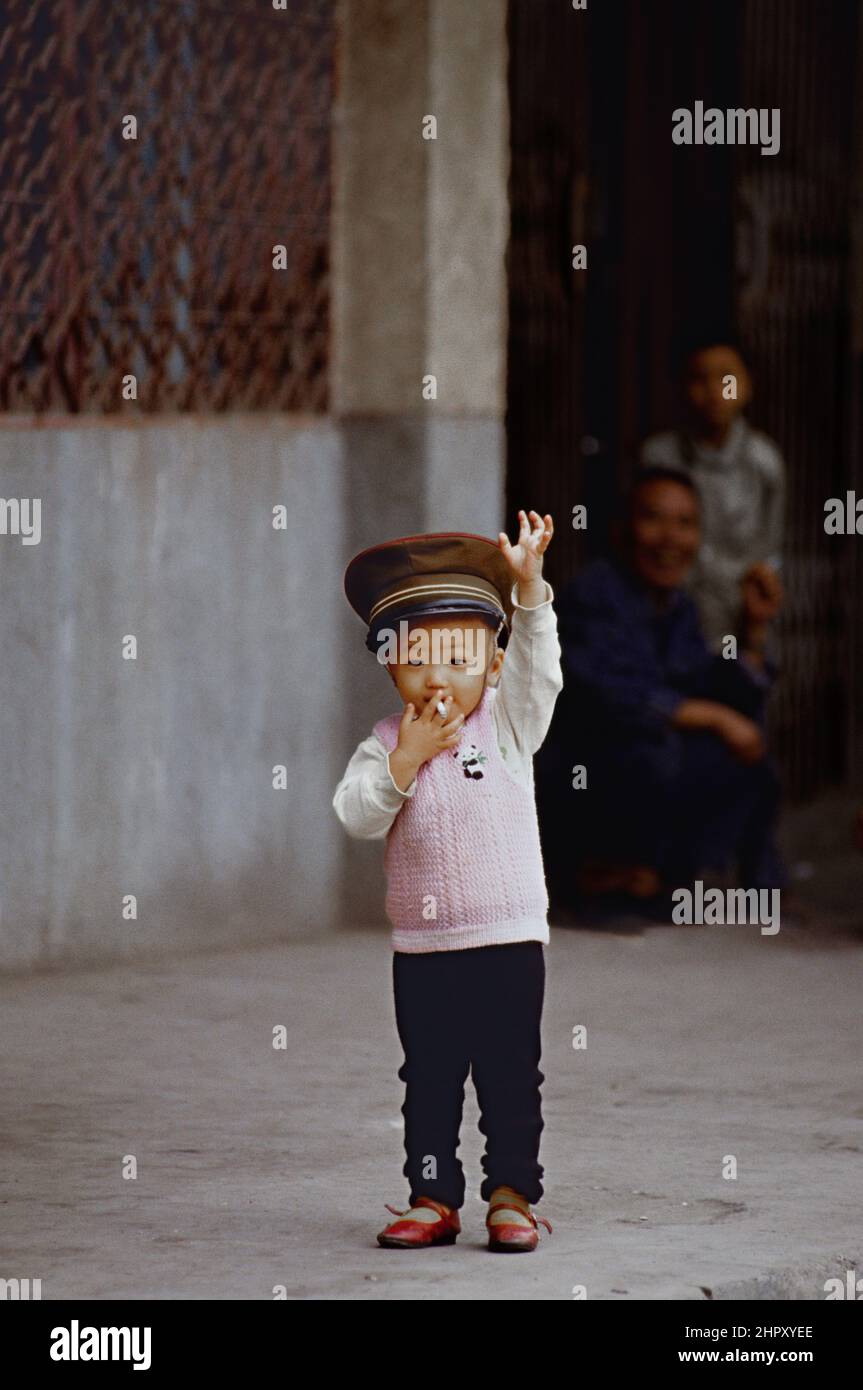 Chines child smoking Stock Photo