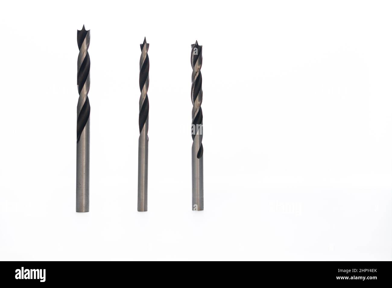 drills of different sizes on white background Stock Photo Alamy
