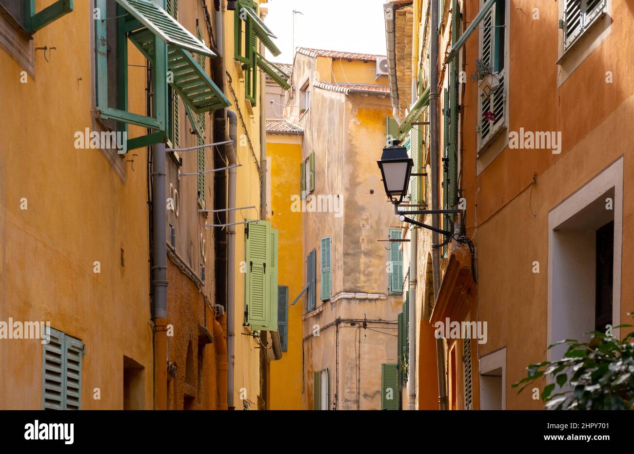A colourful back street in the Old Town section of Villefranche sur Mer ...