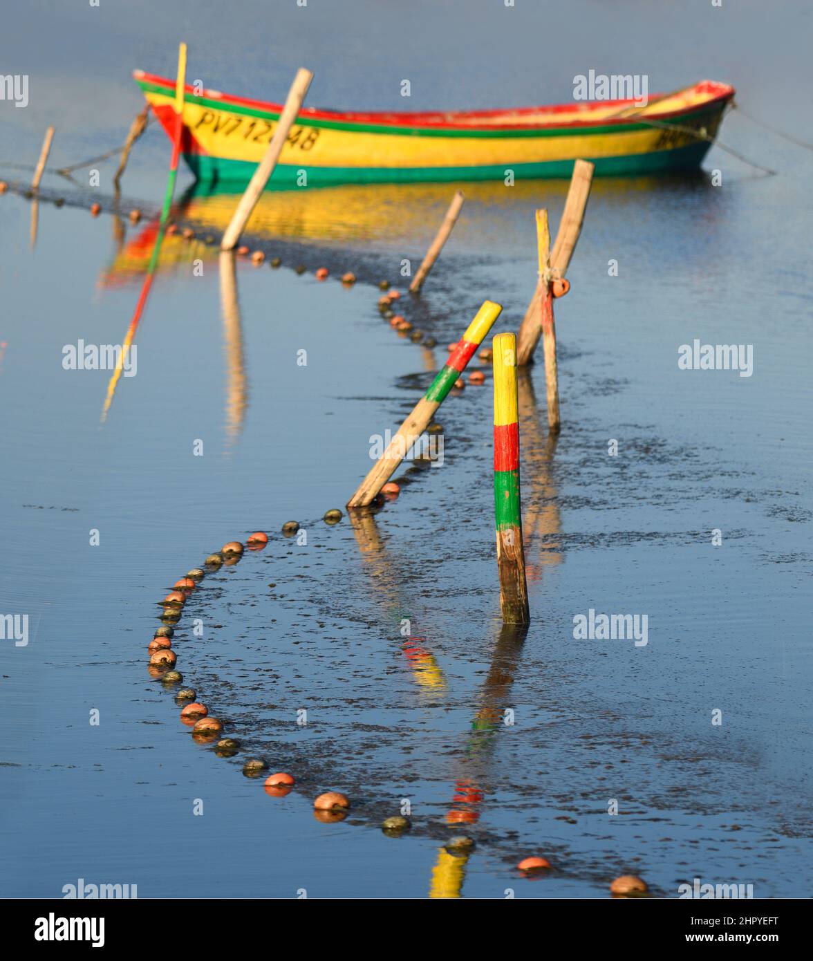 Boat and nets set for eel fishing, Gruissan pond, Aude, France Stock Photo