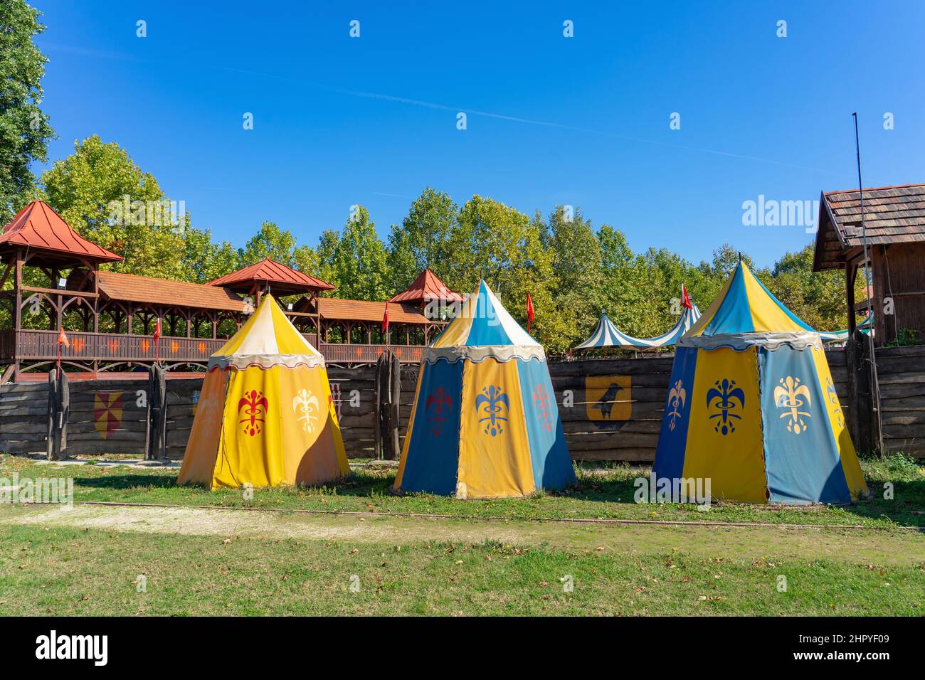 Colorful medieval knight age tents in sumeg castle knight game joust decoration Stock Photo