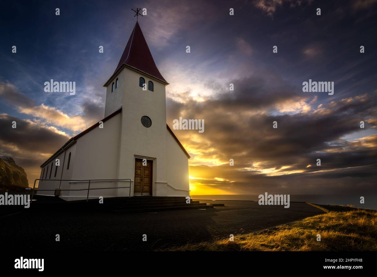 View of the famous icelandic church at sunrise in Vik y Myrdal, Iceland Stock Photo