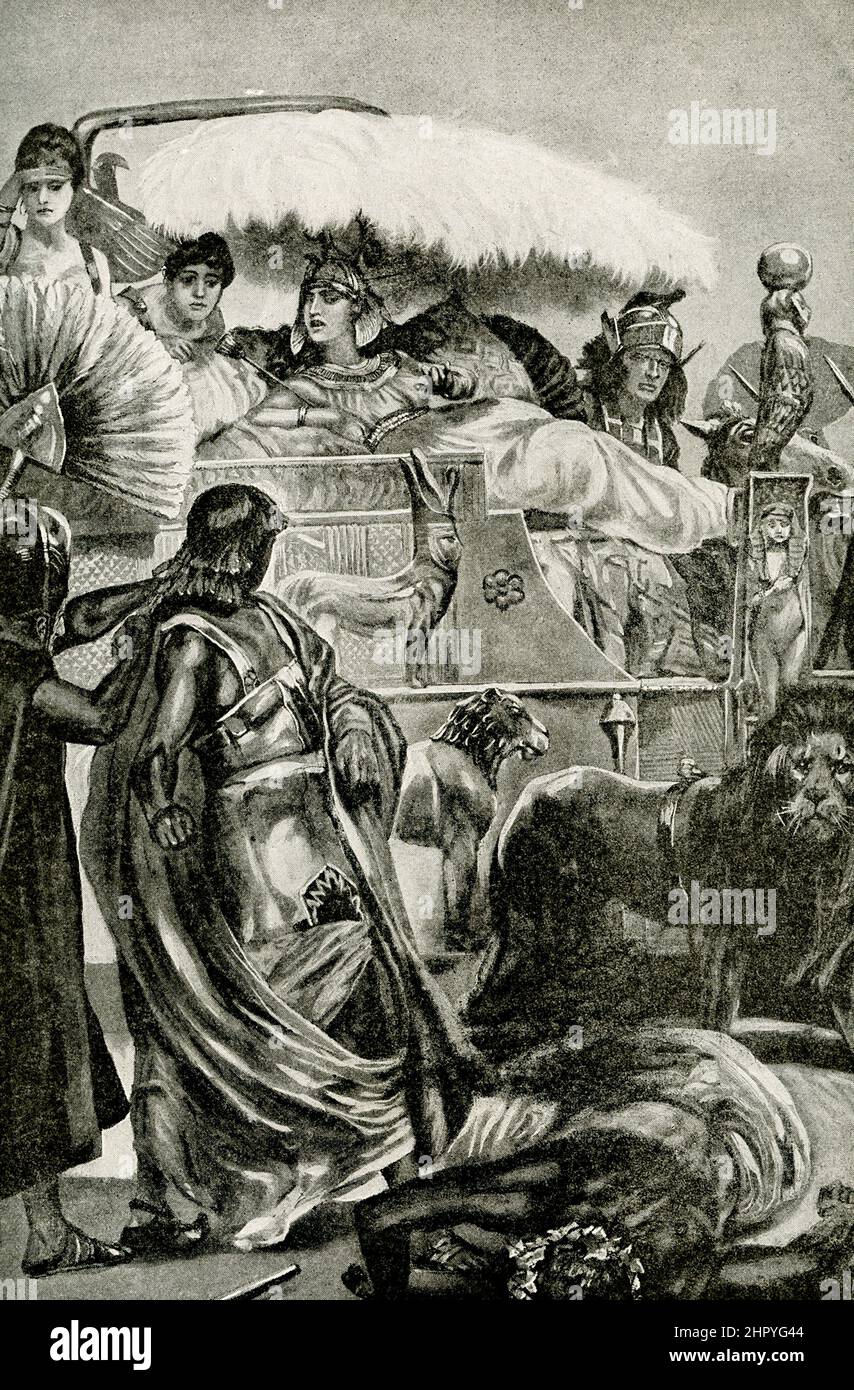 The caption for this 1912 image reads' 'Cleopatra in all her splendor - prisoners of war being brought before Cleopatra, who is seated in her chariot.'  Cleopatra VII (69-30 B.C.), the daughter of Ptolemy XI,  of Egypt. She married her brother Ptolemy XII and began to rule Egypt with him when she was 17. She later aligned her self with Julius Caesar against her brother. Following Caesar's death, she aligned herself with Mark Antony. Following Antony's death, she is said to have killed herself, as legend has it, by the bite of an asp. Stock Photo