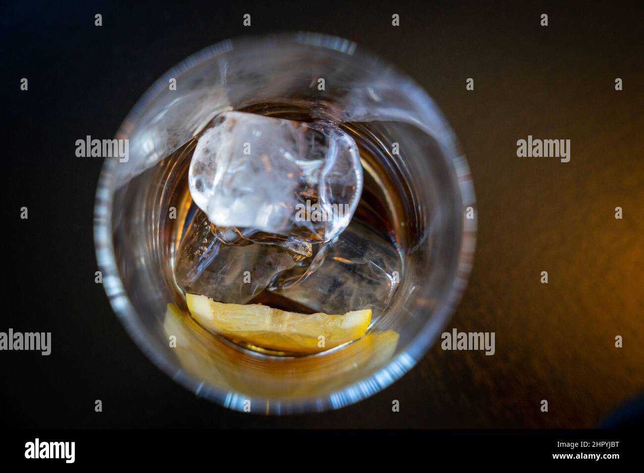 Top view of ice cubes and lemon slice in a glass Stock Photo - Alamy