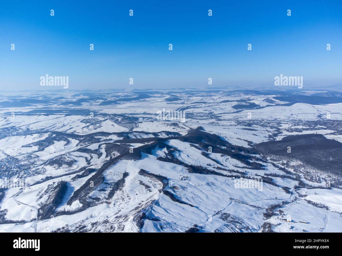 Aerial view of snowy mountains Stock Photo - Alamy