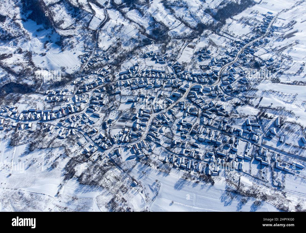 Aerial view of a village covered in snow in Romania Stock Photo - Alamy