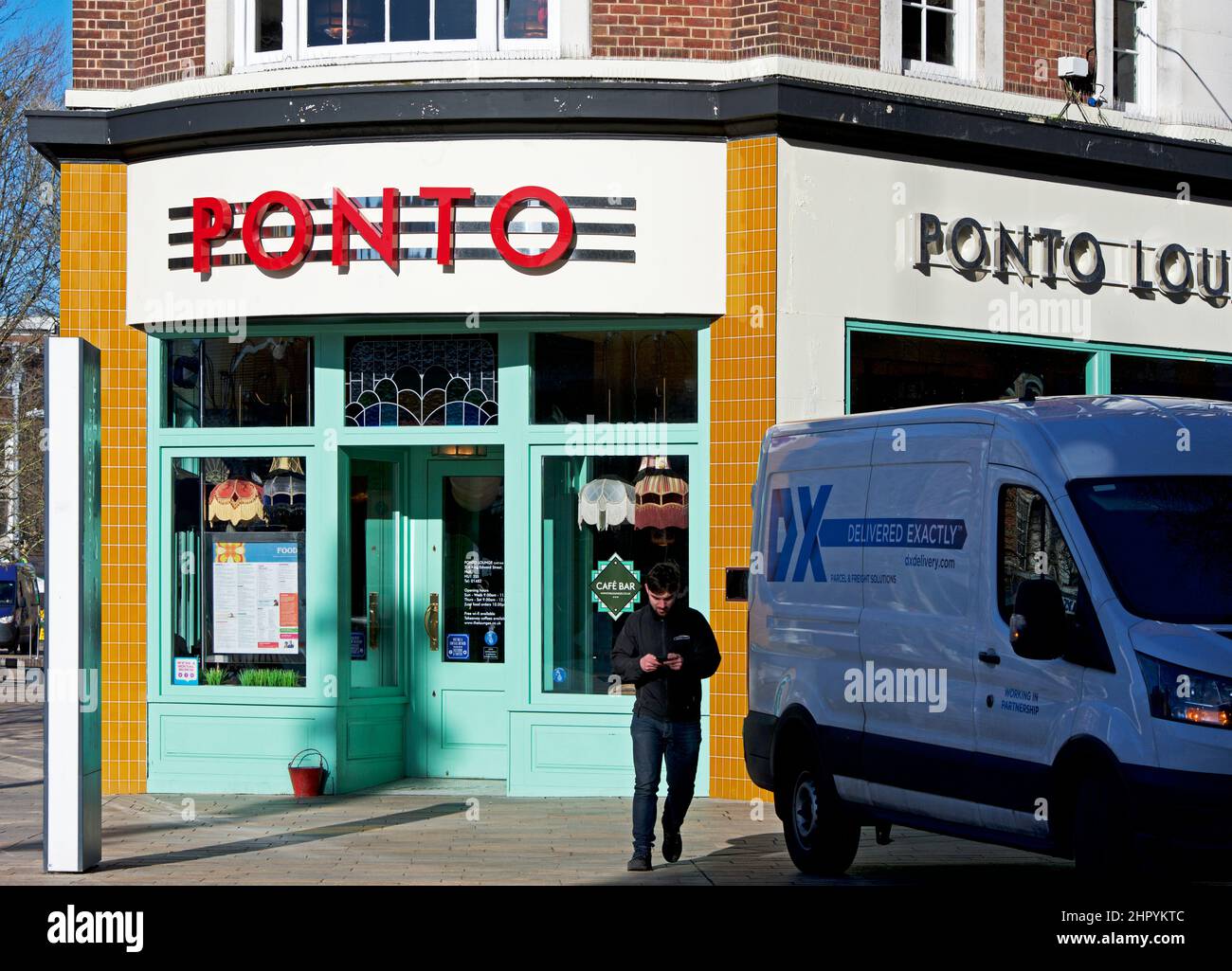 DX delivery van next to Ponto coffee bar, in Hull, Humberside, East