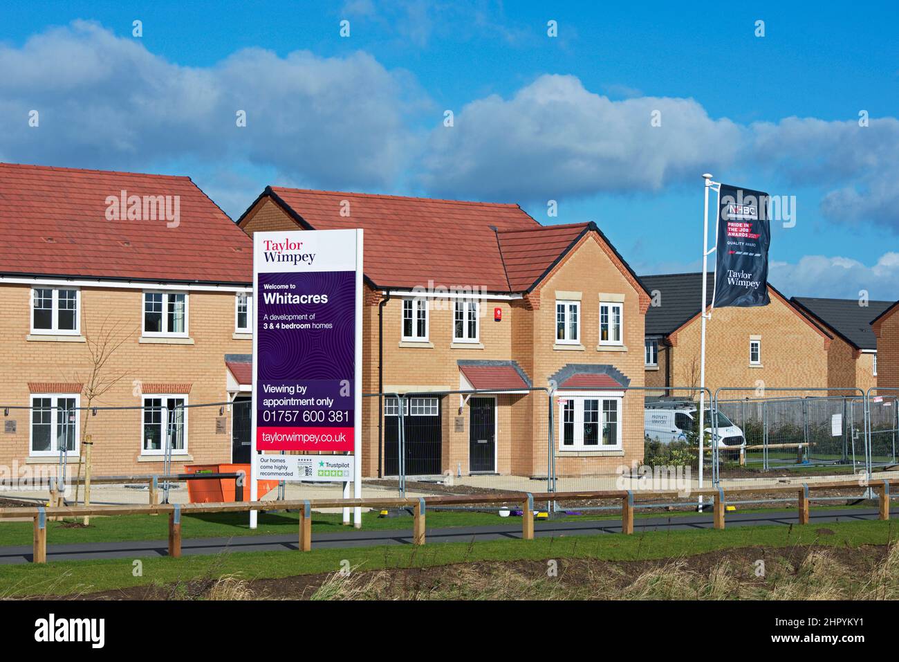 Houses built by Taylor Wimpey at Whitacres, a new housaing development