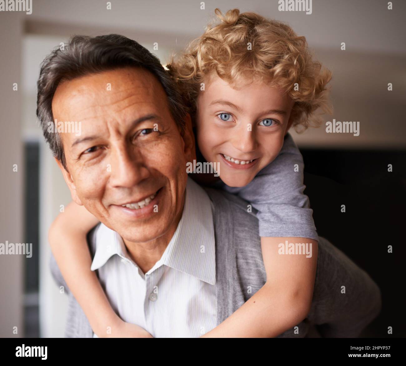 Portrait of grandfather and grandson hires stock photography and