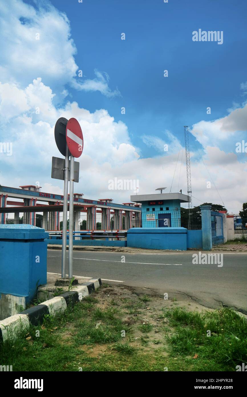 traffic sign board no entry on the road side with blue sky Stock Photo