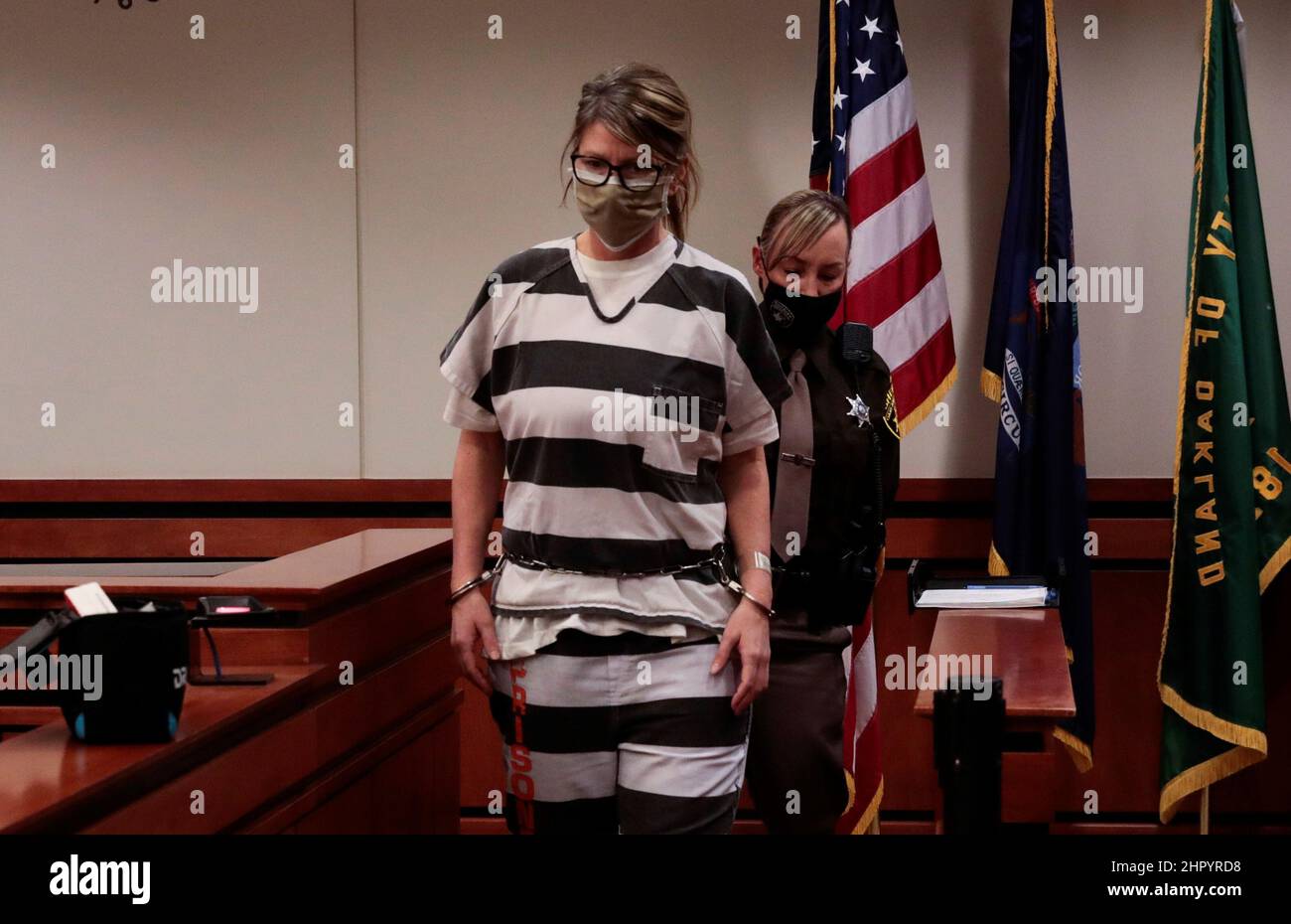 Jennifer Crumbley, the mother of accused Oxford High School gunman Ethan Crumbley, enters the court room during a court procedural hearing in Rochester Hills, Michigan, U.S., February 24, 2022. Stock Photo